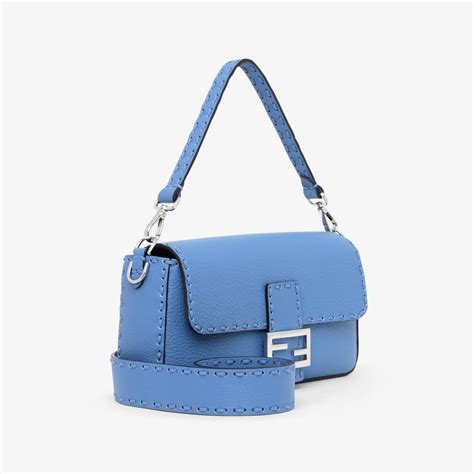 pochette fendi 2111|Light blue Selleria bag with 612 hand.